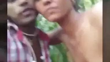 Beautiful shy babe satisfying her lover with a blowjob