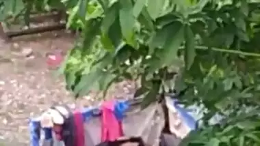 Indian girl bathing outdoor