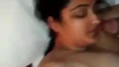 Horny Indian MILF sucking cock and rubbing it all over her body