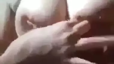 Mallu nude girl presses her juicy boobs and fingers her pussy