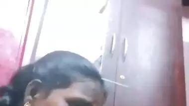 Mature tattooed Tamil wife giving handjob to husband