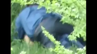 Outdoor sex of escaped pair in park